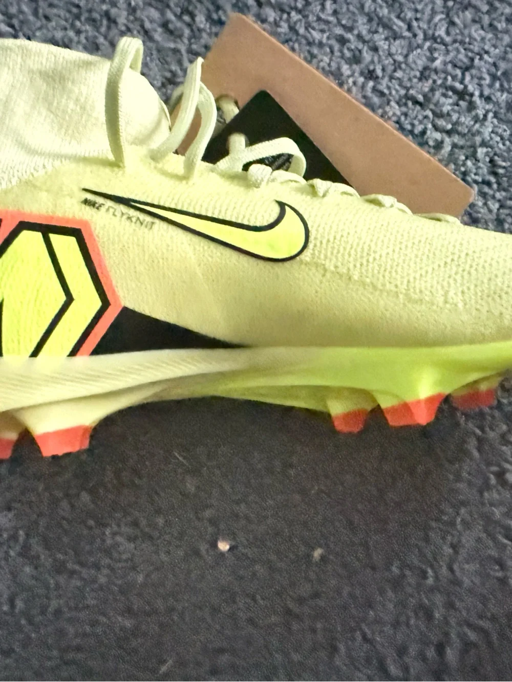 Nike Kids Soccer Cleats in Neon Yellow with Orange Accents